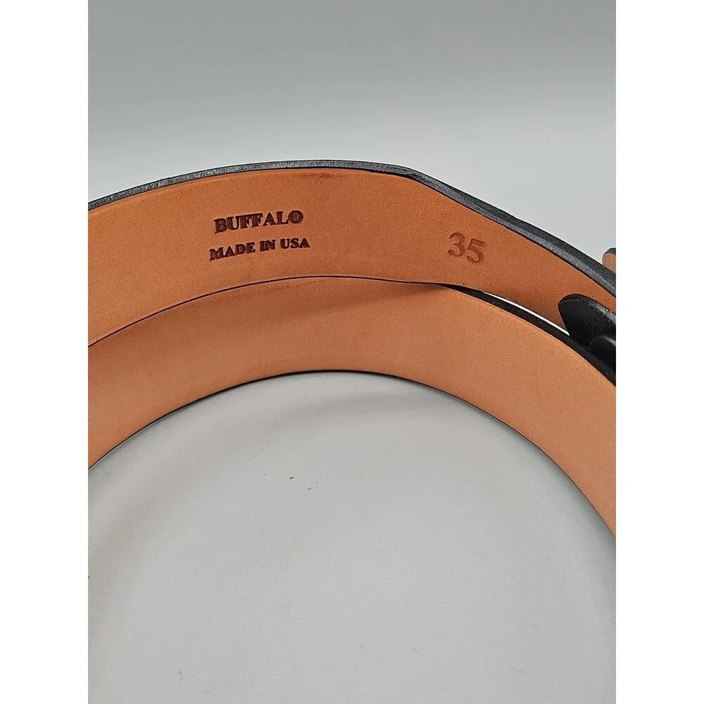 Crescent Leather tapers hand wide